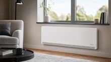 White wall-mounted heater in a modern living room